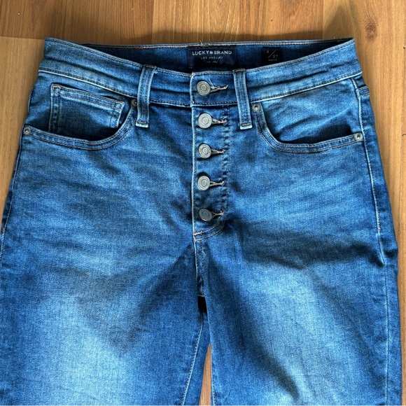 Lucky Brand dark wash blue ankle jeans with frayed edge finish. Size 4, 27. - Picture 1 of 5